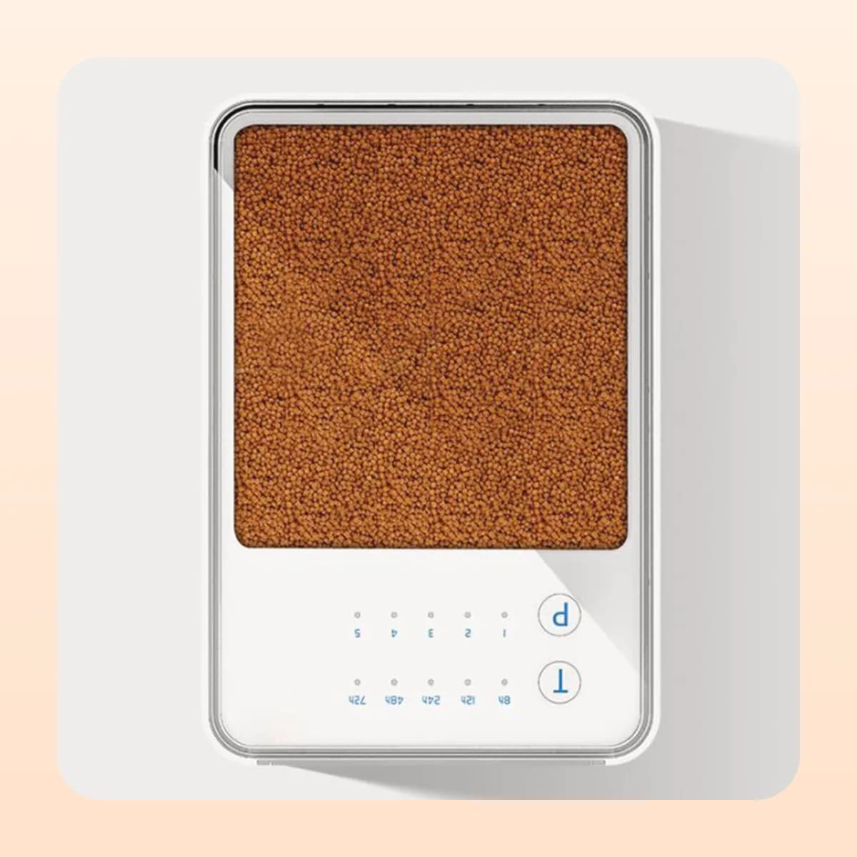 The Kindral digital feeder hopper filled with pellets