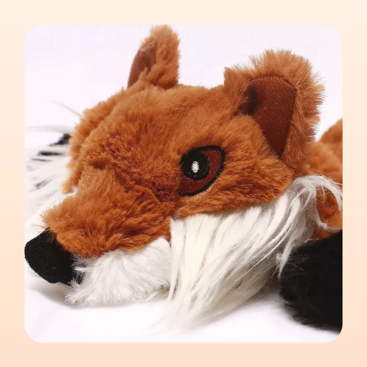 Close-up of the Kindral plush squeaky dog toy