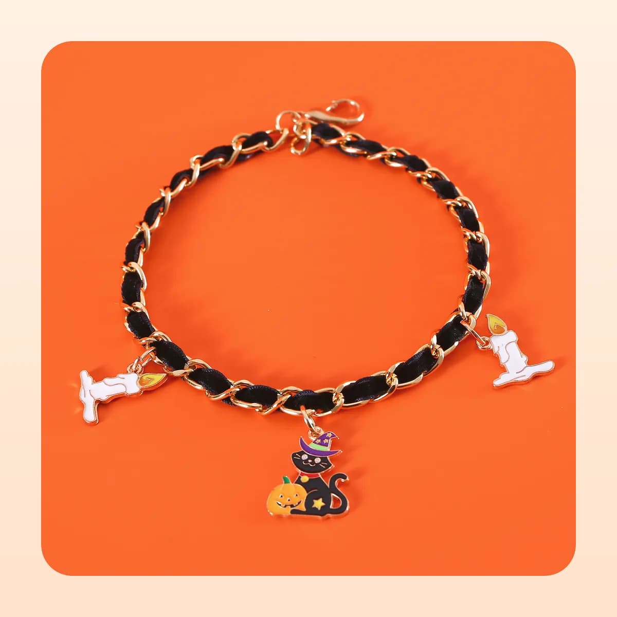 Kindral Halloween charm necklace with the black cat and pumpkin charm