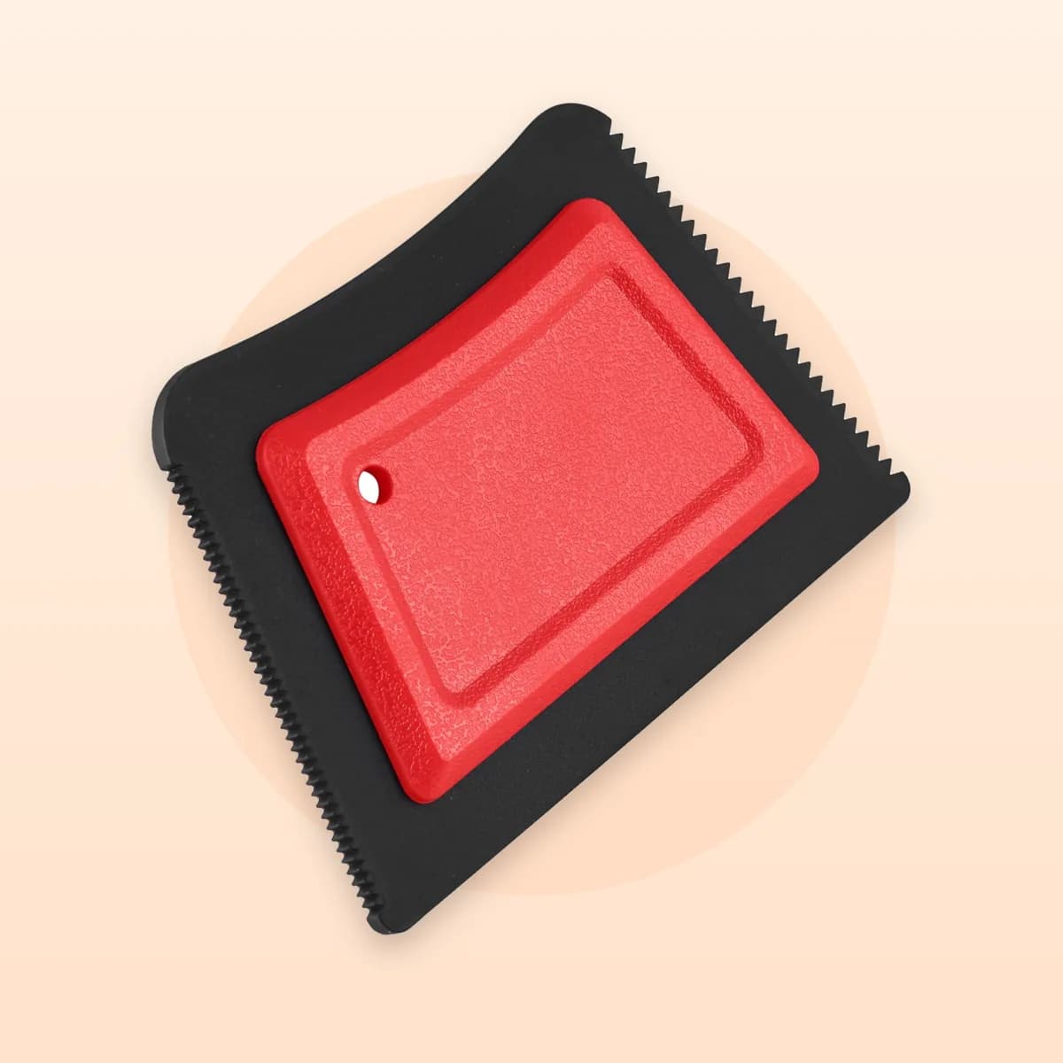 Angled view of the serrated edge on the Kindral pet hair remover