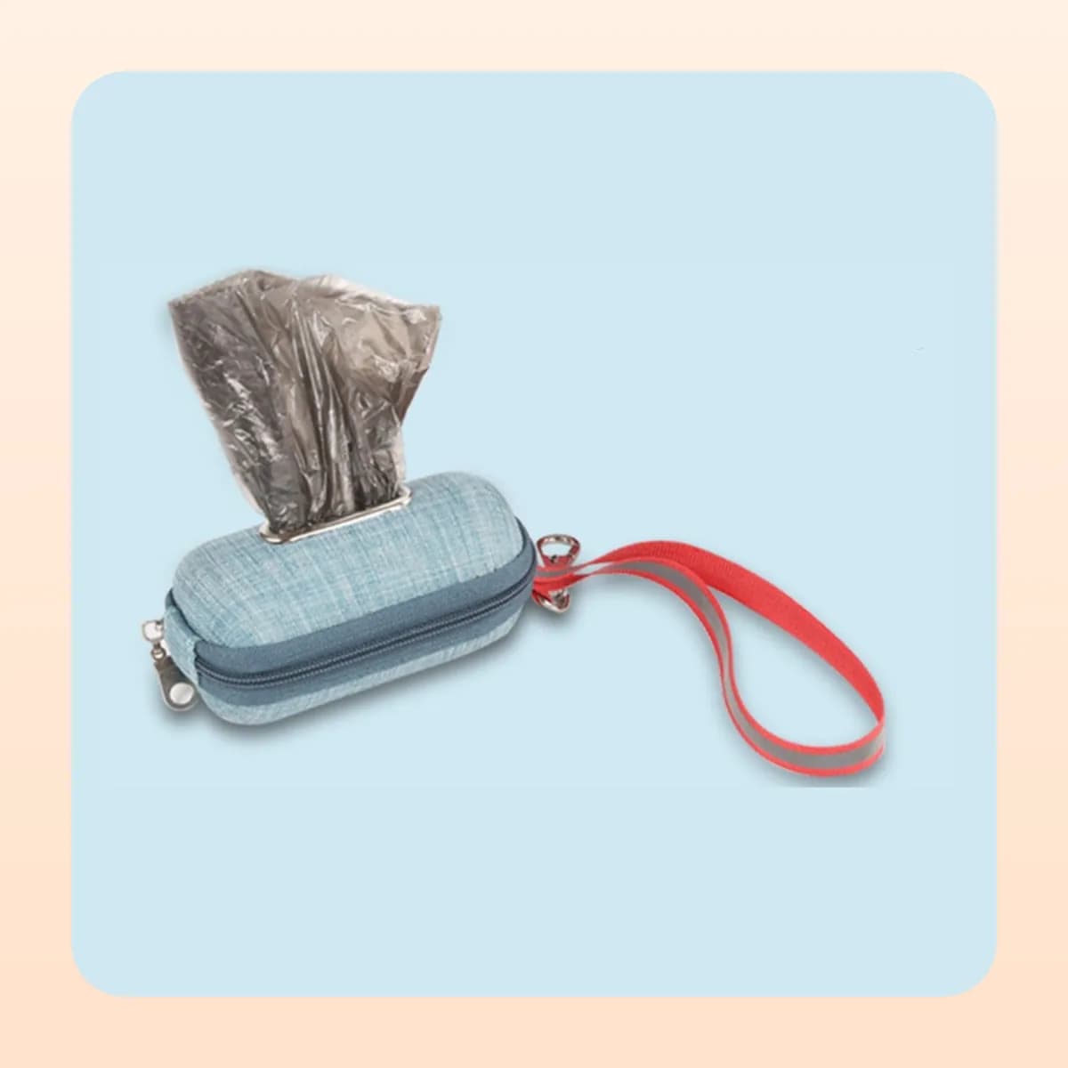 Kindral poop bag dispenser in lake blue with a bag pulled through