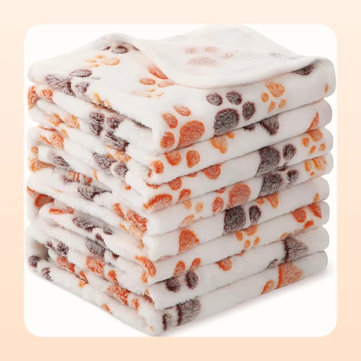 Kindral paw-print fleece blanket in beige
