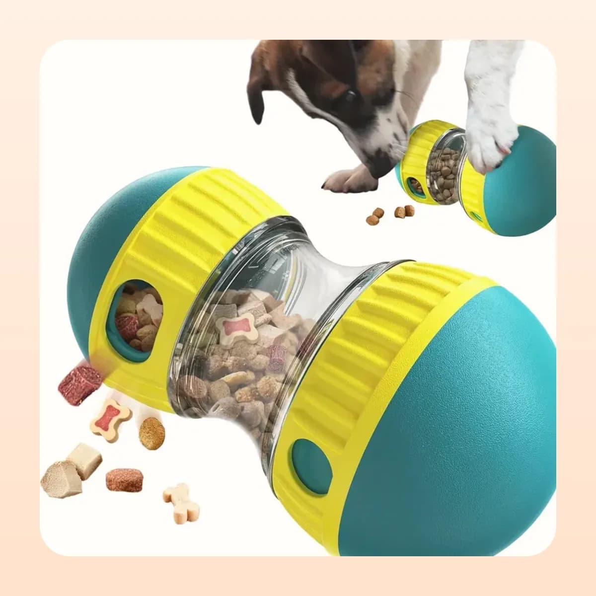 Kindral IQ treat dispenser spilling kibble as a dog paws at it