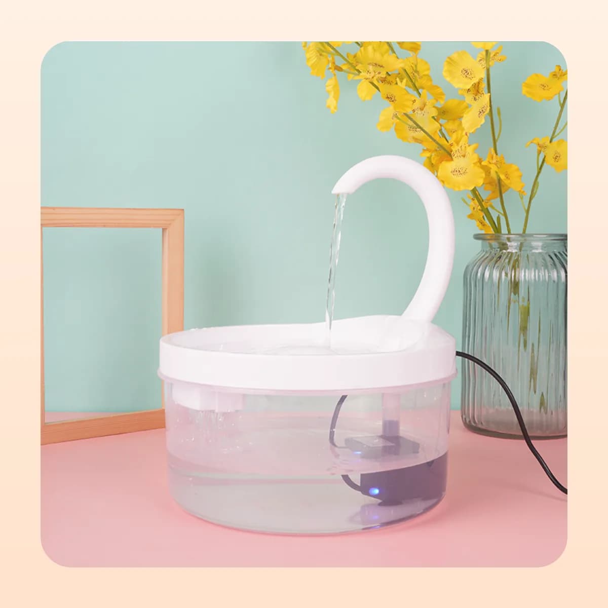 Kindral cat water fountain running on a side table