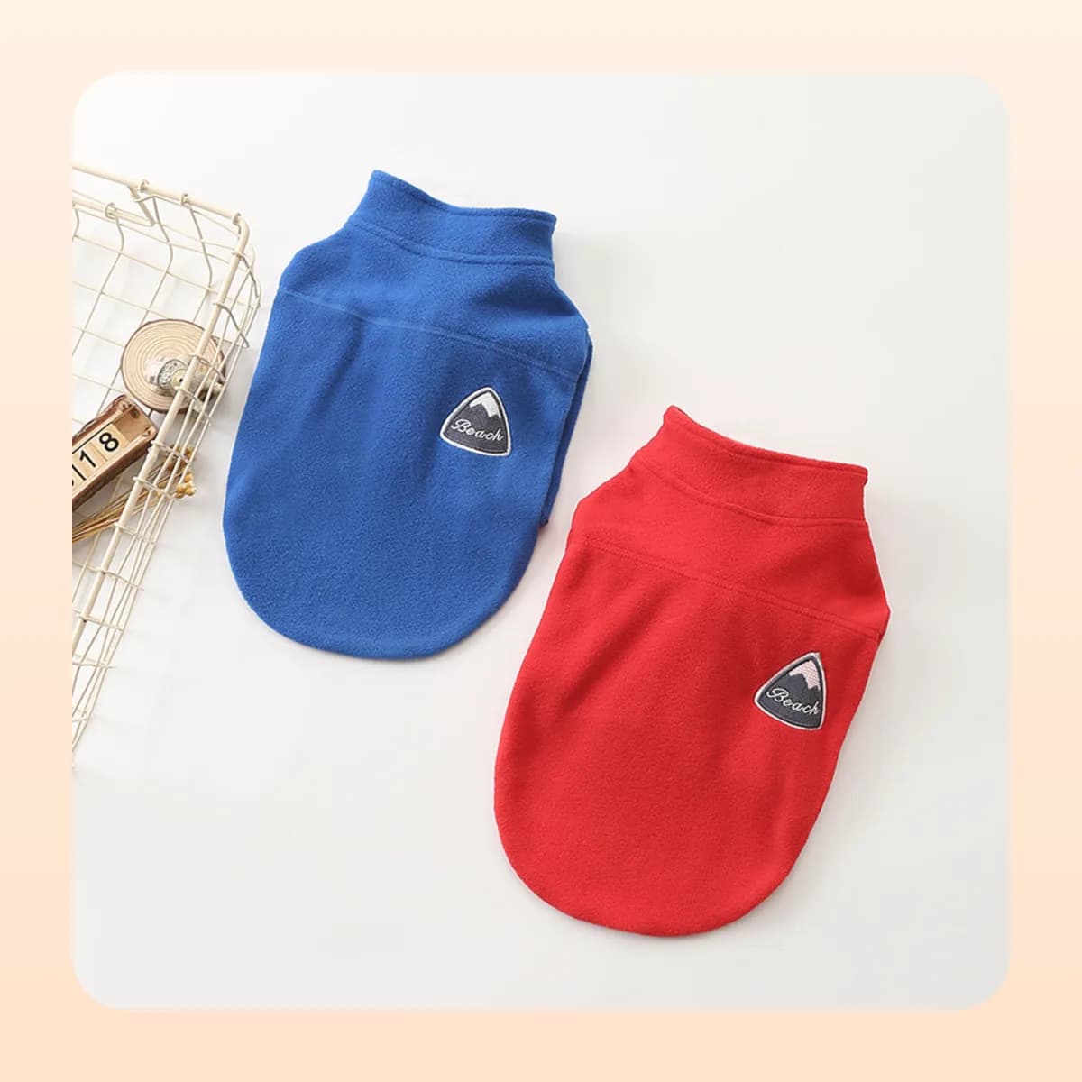 Kindral fleece dog tops in red and blue side by side