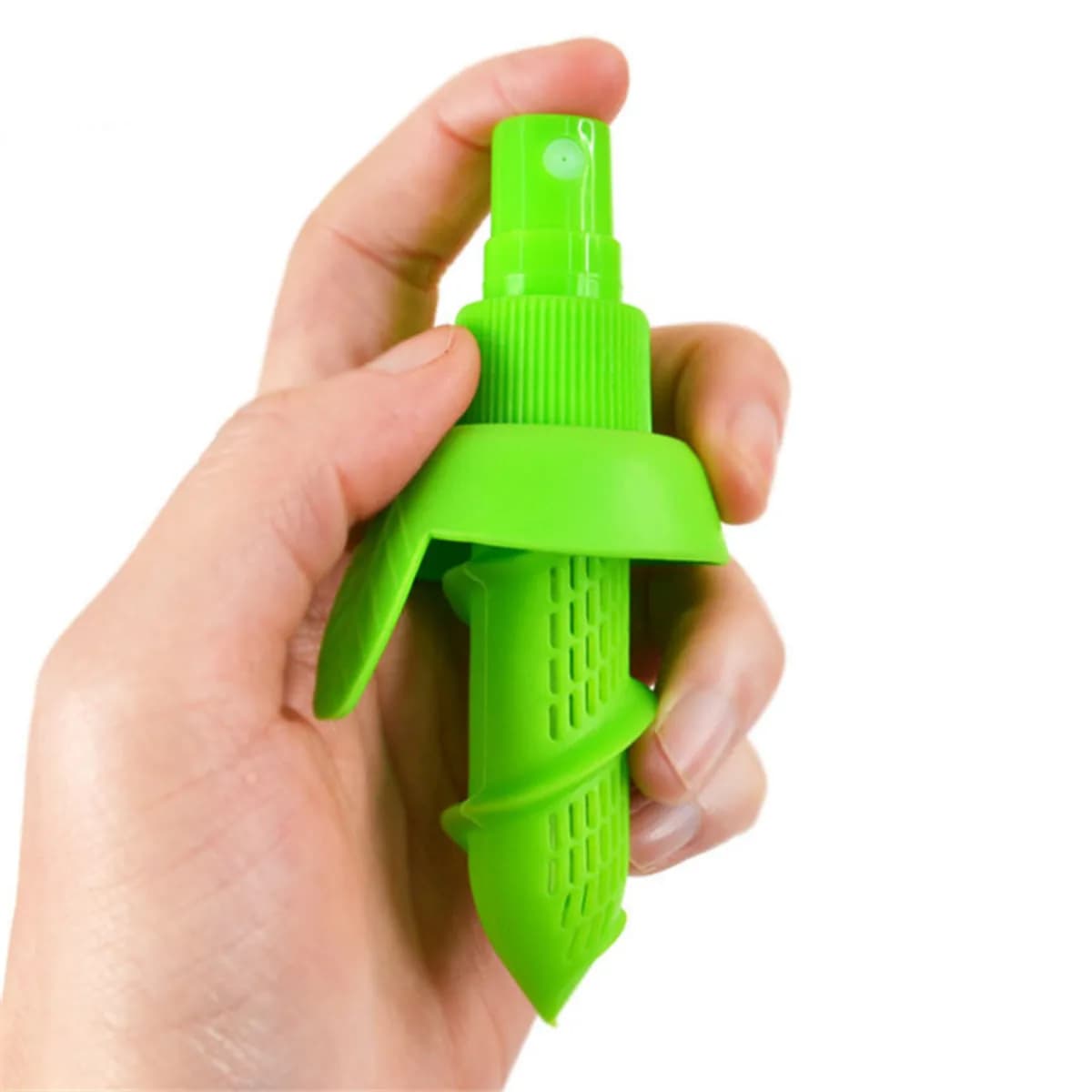 Kindral citrus sprayer in green, held in a hand