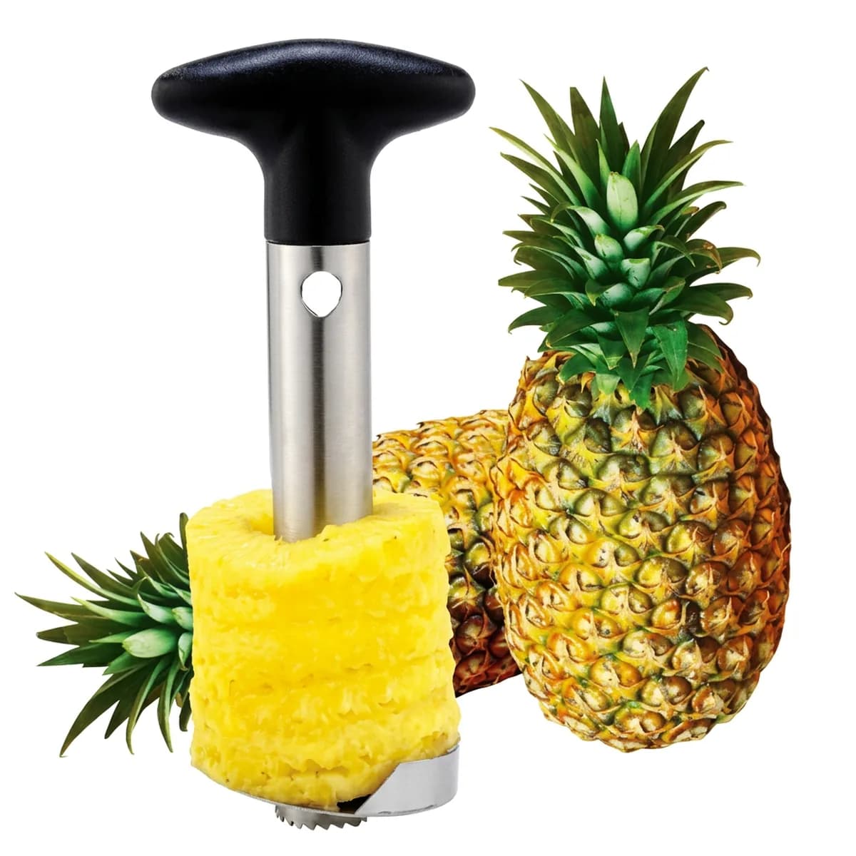 Kindral pineapple corer and slicer in black, standing in a cored pineapple